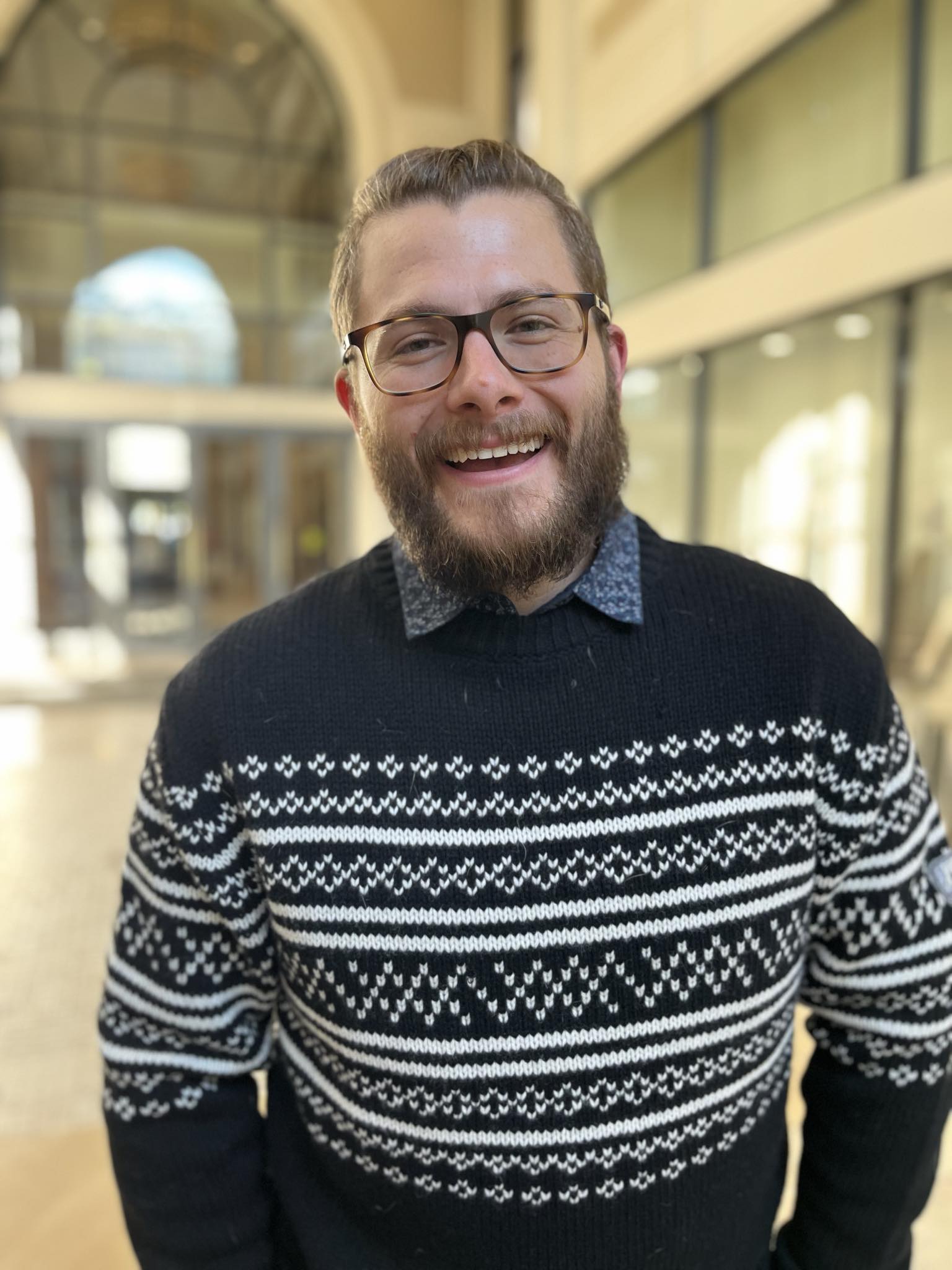 Drew Ackerman In A Sweater, smiling